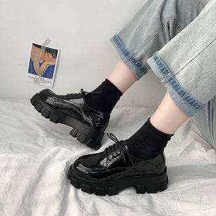 Zapatos de cuero negro de mujer