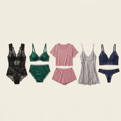 Six women's lingerie and sleepwear sets arranged in a row on a light cream background: a black lace bodysuit, a green bra and shorts set, a pink short-sleeve top and shorts set, a sheer gray slip and matching bottoms set, a navy bra and panties set, and a matching black lace bra and panties set.