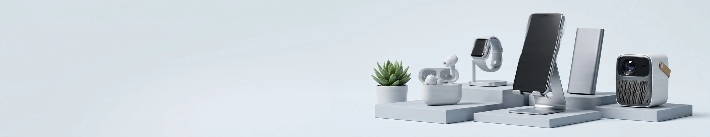 A collection of modern smart home devices and accessories displayed on minimalist gray pedestals against a clean, light gray background. The products include a smartphone, a tablet, a smart speaker, a small potted succulent, a decorative figurine, and other sleek gadgets.