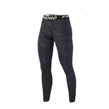 Conjunto de dos piezas ajustado de gimnasio/fitness para hombre